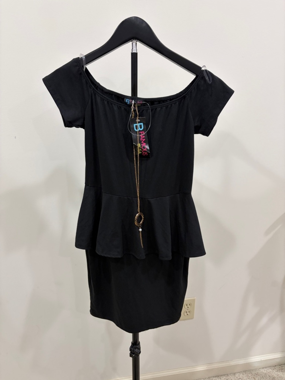 Black Off-Shoulder Peplum Dress with Pendant necklace medium
